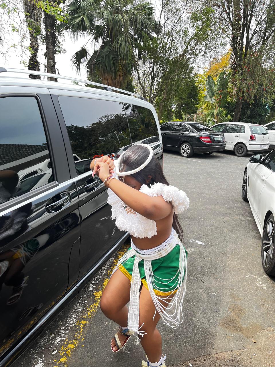 Asandile in traditional attire, photograph 8
